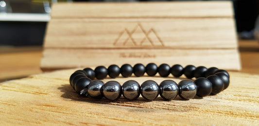 Bracelet de perles en bois The Wood Stock posé à plat